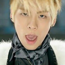 Screenshot from Ring Ding Dong Music Video closeup of Jonghyun's face while he is singing "Baybaaaaayyy"